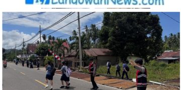 Personel Sat Samapta Polres Boltim Gelar Patroli dan Pengaturan Lalu Lintas di Tutuyan